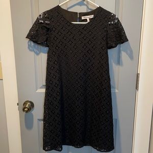 BCBG black dress with black slip and patterned fabric over